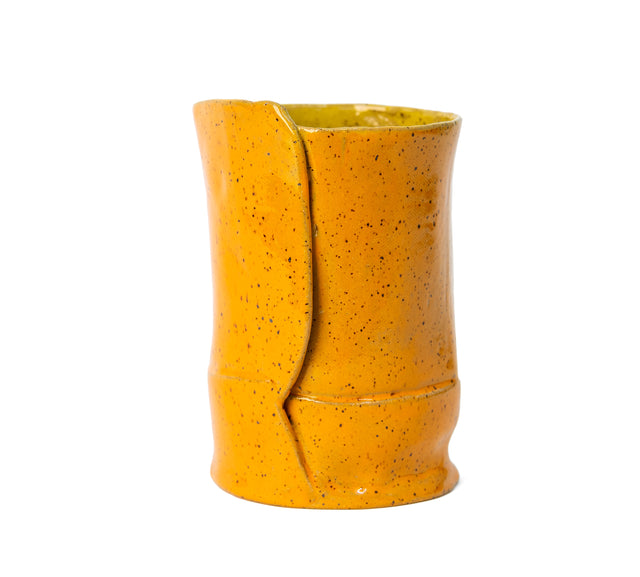 Marigold-glazed stoneware vessel, side view of the overlapping wrapped seam, by Peter Souza Jr., J Schatz