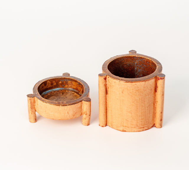 Ceramic planter, side view with exterior posts and legs, J Schatz