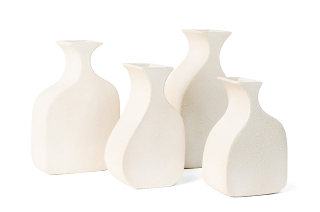 One-of-a-kind ceramic vessels, planters, and centerpiece forms by J Schatz.