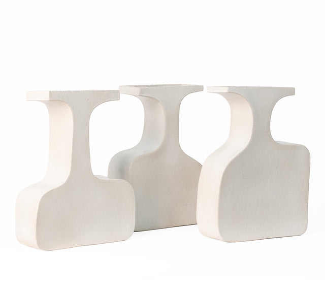 One-of-a-kind ceramic vessels, planters, and centerpiece forms by J Schatz.