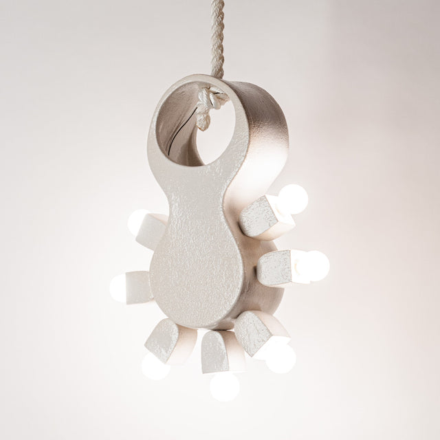One-of-a-kind ceramic lighting by J Schatz — sculptural lamps, pendants, and illuminated forms.