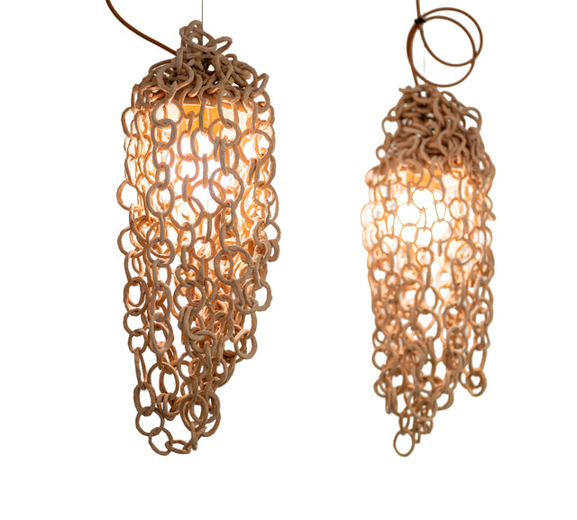 Ceramic chain pendant lamps, detail of hand-rolled stoneware links and fabric cord, by Peter Souza Jr., J Schatz