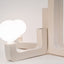 Ceramic chandelier with four frosted globes on a stepped column, J Schatz