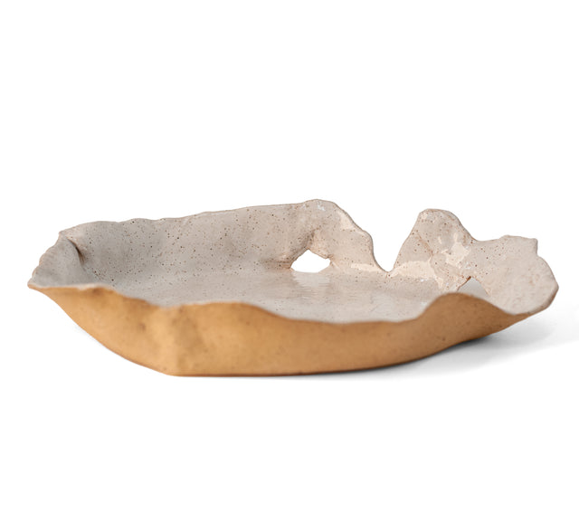 Ceramic bowl, side view with raw speckled exterior and folded rim, J Schatz