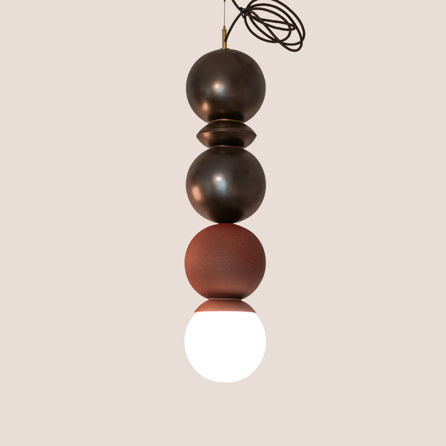 Dot Dot Dot Pendant Metallic Edition in Bronze, Bronze, and Rust Red with omega disc