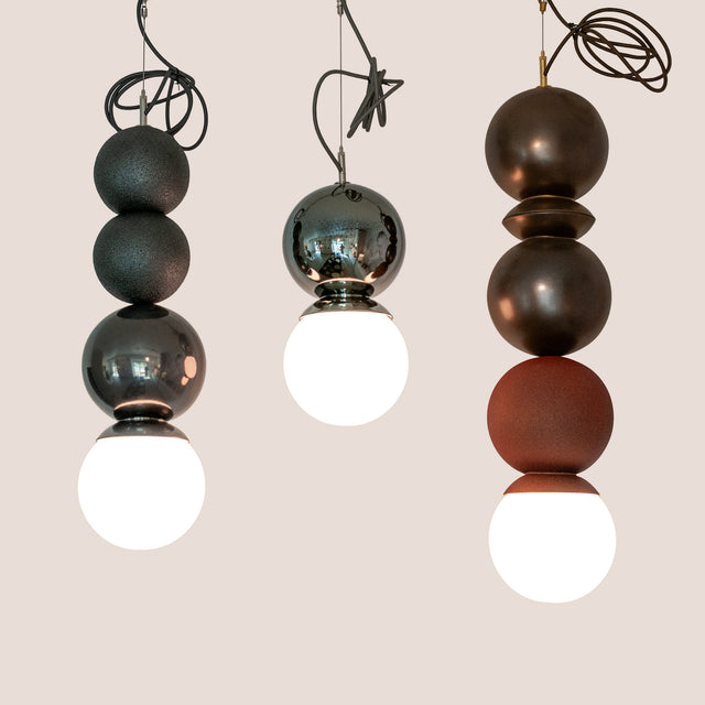 Dot Dot Dot Pendants Metallic Edition in Graphite Lava, Metallic Black, and Bronze