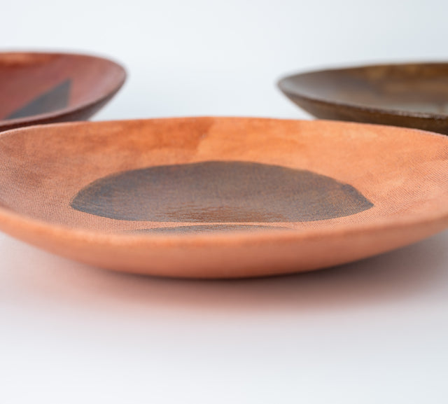 Geometria bowls in glazed stoneware, seen from the side, J Schatz