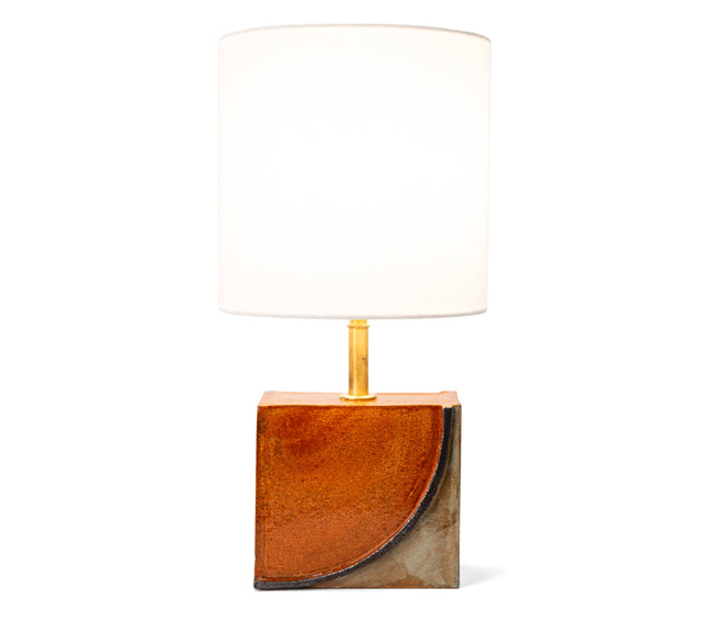 Geometria brick lamp 2, a rust quarter arc on grey glazed stoneware, brass stem and fabric shade, by Jim Schatz, J Schatz