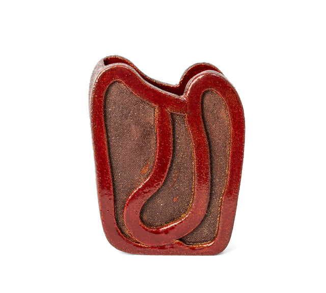 Ribbon vessel 1, a red glazed ribbon looping over a brown stoneware field, by Jim Schatz, J Schatz