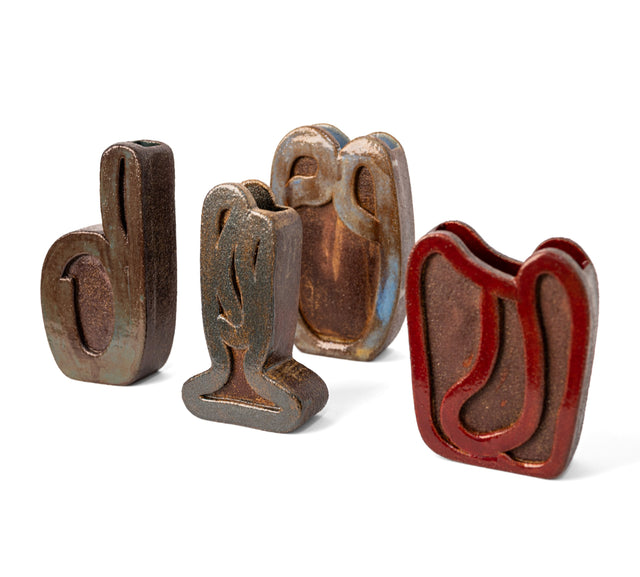 Ribbon vessels 1 to 4, flat stoneware vessels drawn with raised glazed ribbons of clay, by Jim Schatz, J Schatz