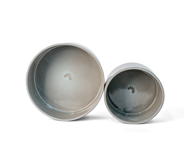 Slate grey ceramic Utilità bowls, large and small, viewed from above, J Schatz.