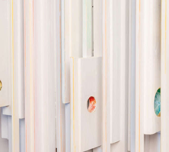 Wall sculpture, angled view of the tall painted column, J Schatz