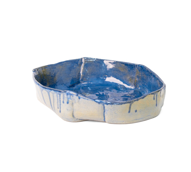 Slab-built stoneware bowl with a deep blue glaze inside and drips down a pale exterior, by Peter Souza Jr., J Schatz