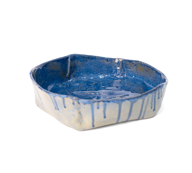 Slab-built stoneware bowl, alternate view of the folded walls and blue drips, by Peter Souza Jr., J Schatz