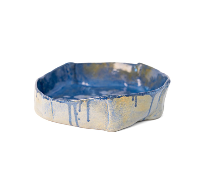 Slab-built stoneware bowl, low side view of the blue glaze running over the rim, by Peter Souza Jr., J Schatz