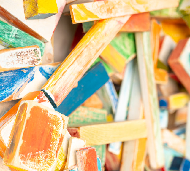 Detail of worn paint surfaces and stacked wood fragments, J Schatz