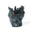 Blue-glazed stoneware vessel folded from torn slabs with a ragged rim, by Peter Souza Jr., J Schatz