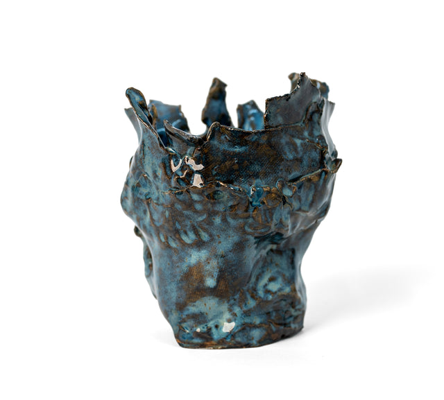 Blue-glazed stoneware vessel folded from torn slabs with a ragged rim, by Peter Souza Jr., J Schatz