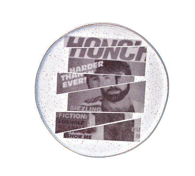 Honcho masthead, cover lines, and a bearded figure cut into offset strips under glaze on speckled stoneware plate, J Schatz and Peter Souza Jr.