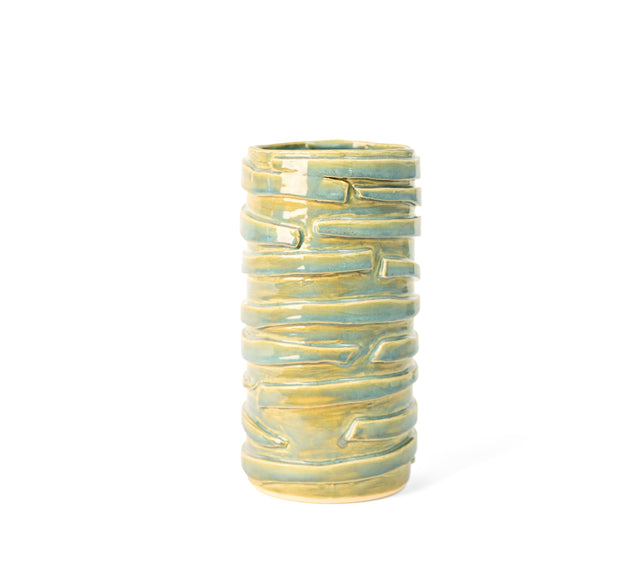 Stoneware vessel wrapped in overlapping clay bands under pale green and blue glaze, J Schatz