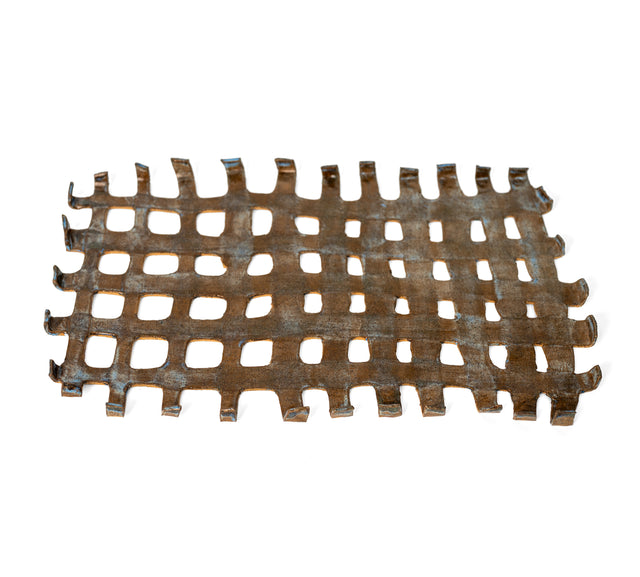 Woven speckled stoneware tray with an open grid narrowing from square openings to slots, by Peter Souza Jr., J Schatz