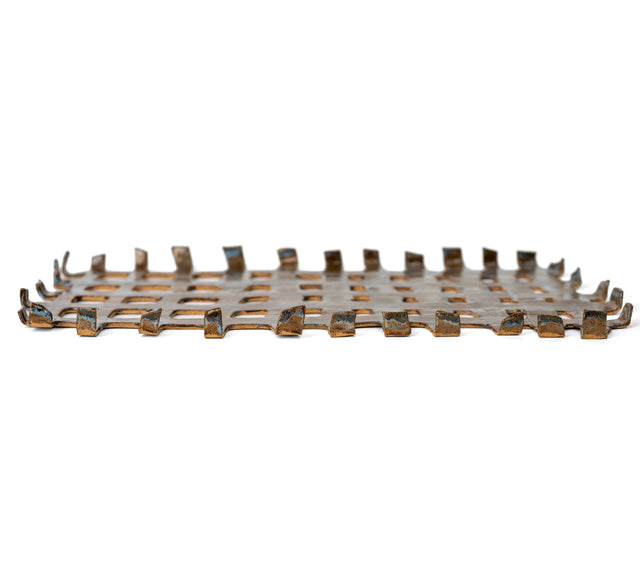 Side view of a woven stoneware tray, glazed strip ends over raw speckled clay edges, by Peter Souza Jr., J Schatz
