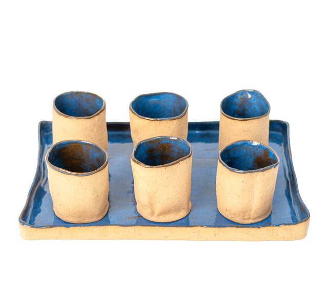 Ceramic serving set, detail of cobalt blue cup interiors, J Schatz