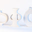 Circular Cut Out Vessels in White