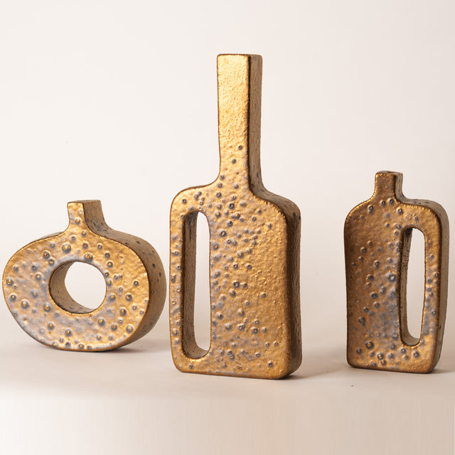 Cut Out Vessels in Blistered Bronze